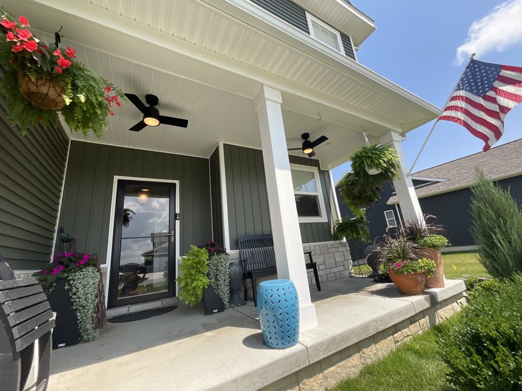 A suburban house in Minnesota with new outdoor lighting installed by Randy's Electric & Plumbing